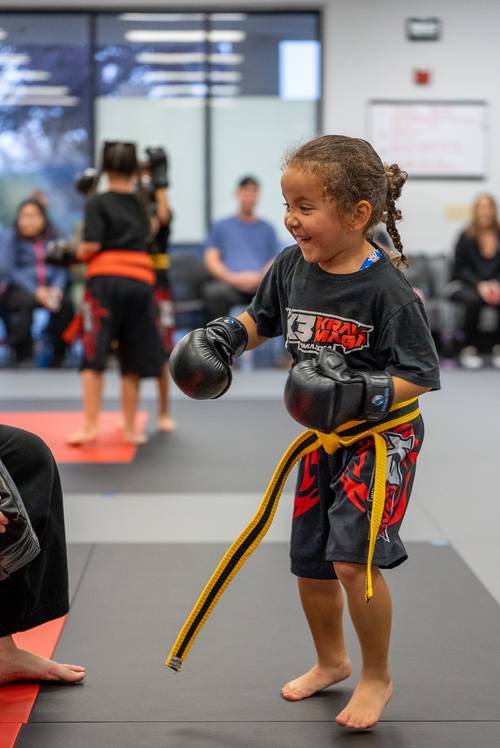 Young K3 student in boxing gloves on the mat in Roseville