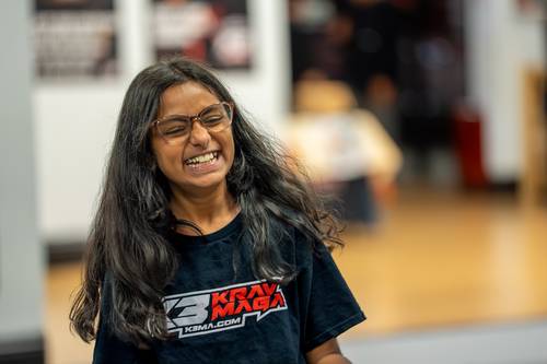 Teen student smiling after a Krav Maga class at K3 Martial Arts in Roseville