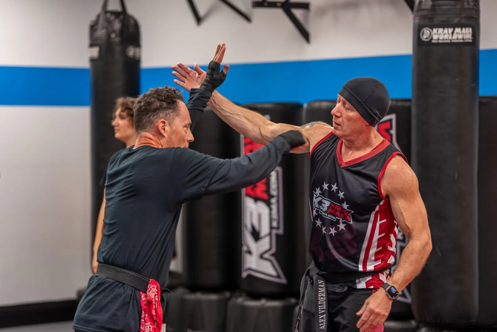 Two instructors working a self-defense block